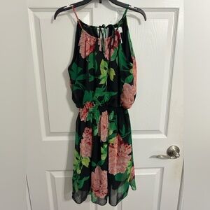 Midi black dress with pink flowers design and green leaves